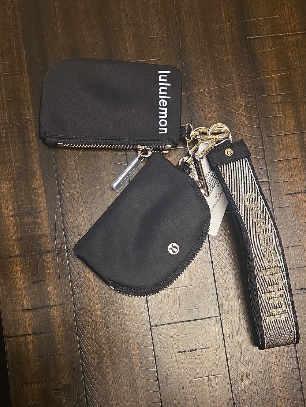Lululemon Black Dual Pouch Wristlet Metallic Wordmark